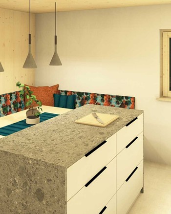 Küche mit Insel und Esstisch im Chalet.