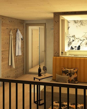 Ein Balkon mit einer Sitzbank und einem Beistelltisch mit einer Flasche Wein und zwei Gläsern. 