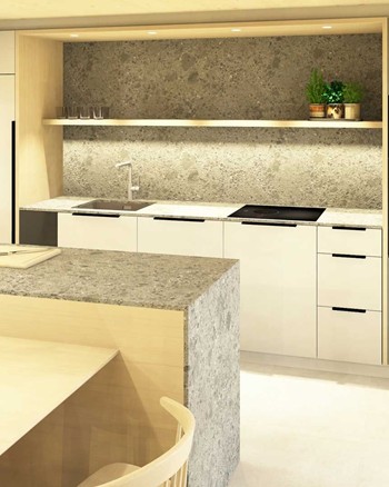 Küche mit Insel und Esstisch im Chalet.