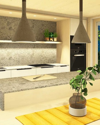 Küche mit Insel und Esstisch im Chalet.