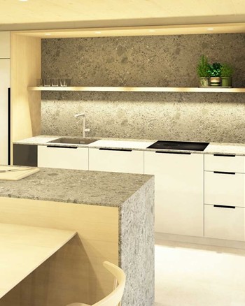 Küche mit Insel und Esstisch im Chalet.