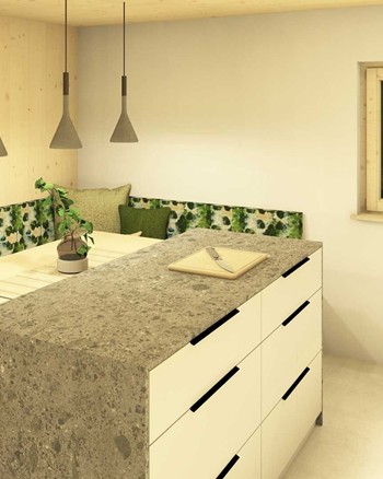 Küche mit Insel und Esstisch im Chalet.