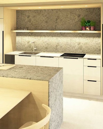 Küche mit Insel und Esstisch im Chalet.