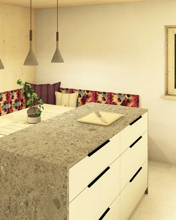 Küche mit Insel und Esstisch im Chalet.