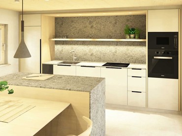 Küche mit Insel und Esstisch im Chalet.